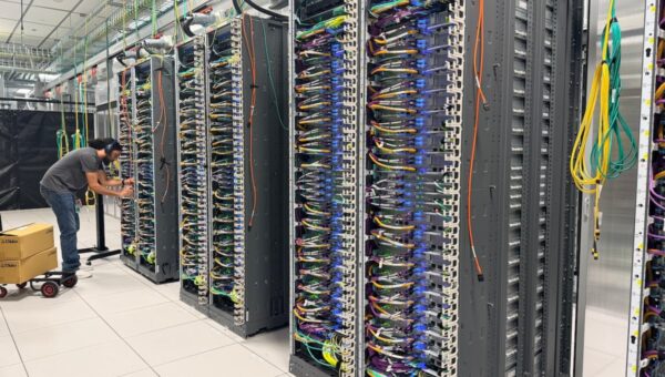 An exclusive tour of Amazon’s Trainium lab, the chip that’s won over Anthropic, OpenAI, even Apple